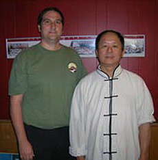 Dr. Clippinger doing Brush the Knee in the Yang Sword (Gim) Form